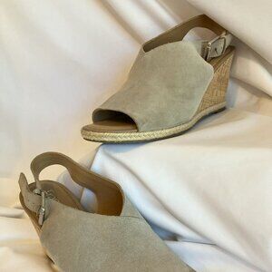 Franco Sarto wedge sandals featuring a peep toe and slingback strap - size 9M